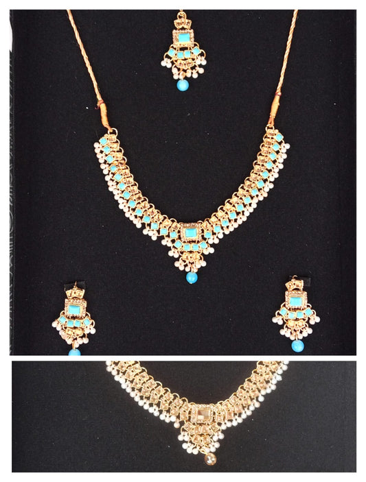 Stunning pearls jewelry set earrings with mata tikka.