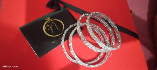 Stunning Gold Bangles with pink and white Accents