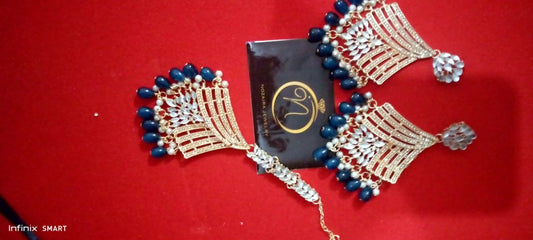 Blue beaded earrings and matha tika